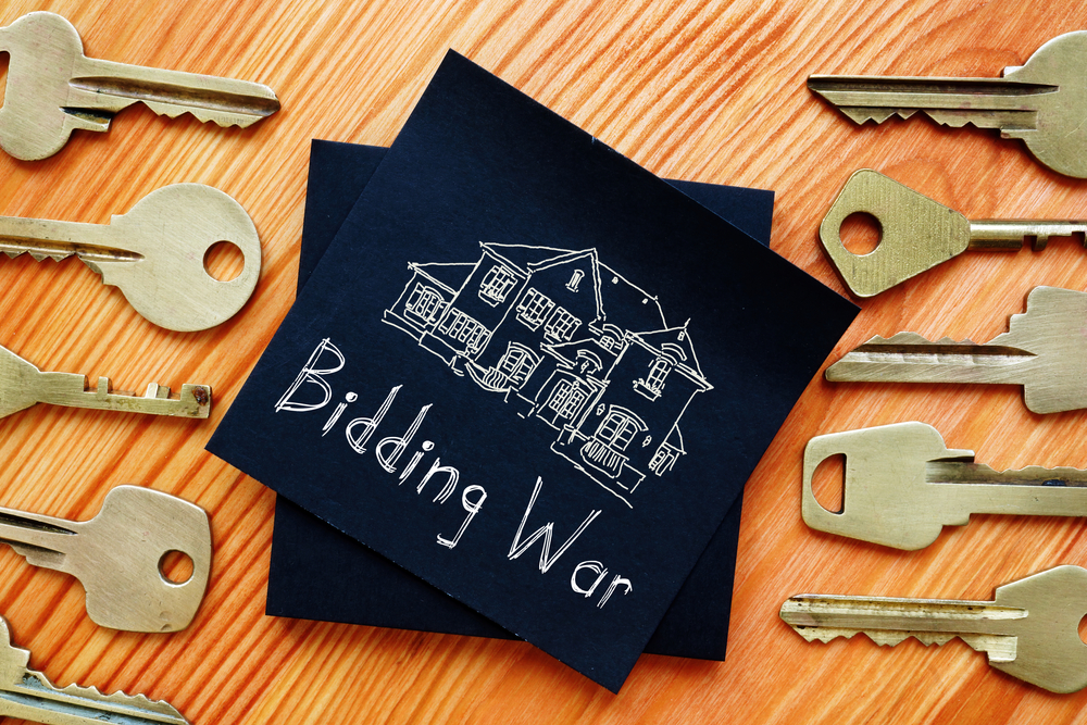 Buying,A,Home,In,A,Bidding,Waris,Shown,On,The